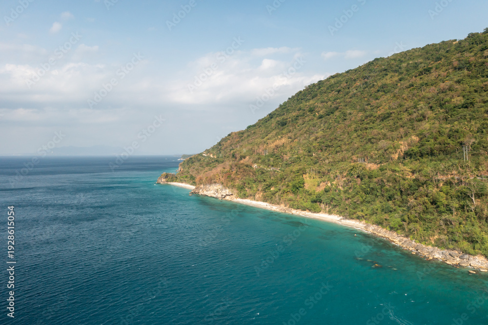 Fototapeta premium Aninuan Beach tropical coastline aerial view, Puerto Galera, Philippines