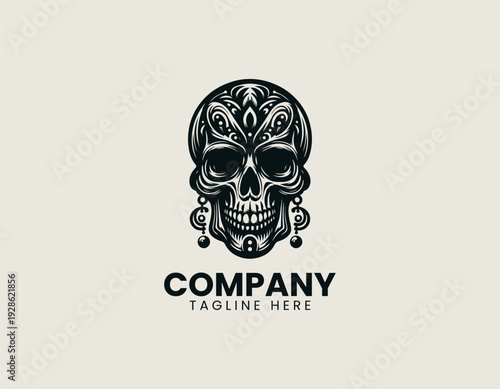 Detailed stylized skull with elongated jaw and earrings is presented as bold monochrome vector logo on clean white background