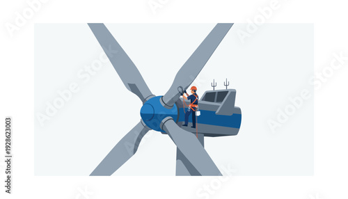 Technician performing maintenance on large wind turbine for renewable energy