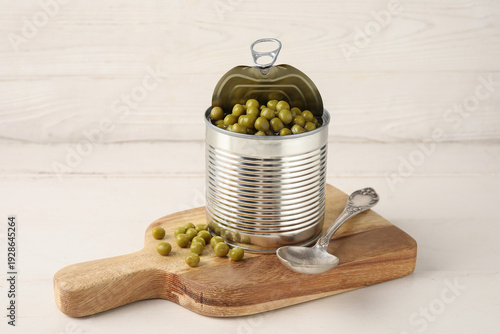 Tin can and cutting board w...