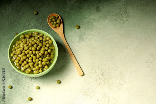 Bowl and wooden spoon with ...