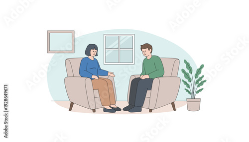 Therapist and patient in counseling session at modern clinic