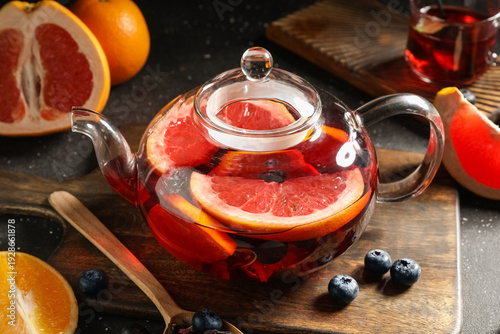 Glass teapot with hot fruit...