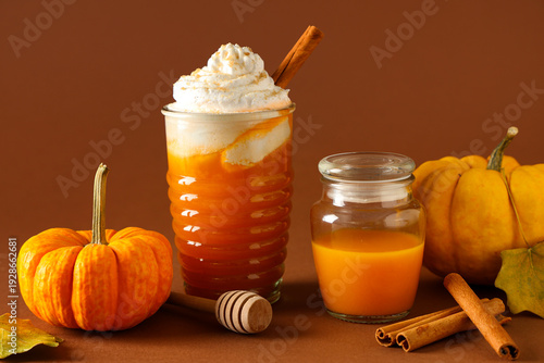 Glass of orange pumpkin spi...