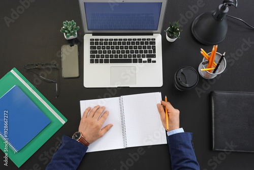 Top view of businessman wri...