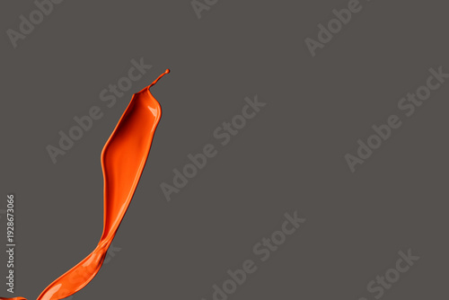 Splash of orange paint on d...
