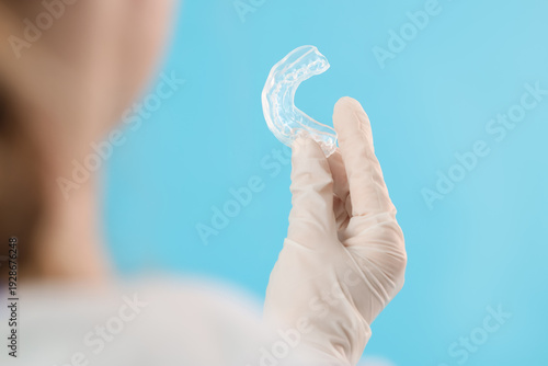 Female dentist with occlusa...