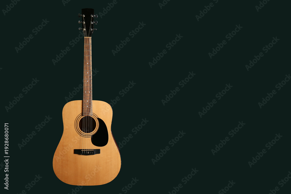 Fototapeta premium Acoustic guitar on black background