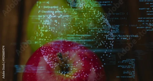 Obraz Showing glossy red apple with stem sitting on wood board, green apple behind, cyan code dots