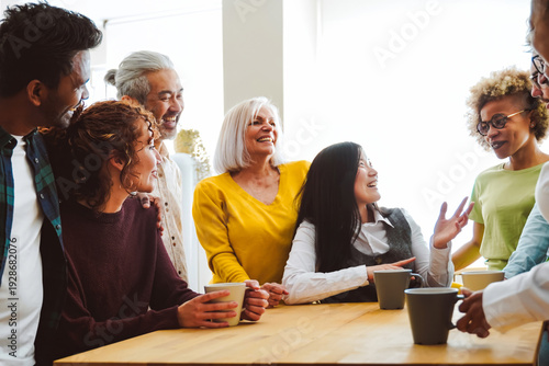 Billede på lærred Group of multiracial friends with different ages and ethnicities have fun in cof