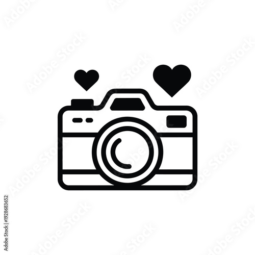 A simple black and white illustration of a camera with two hearts above it.