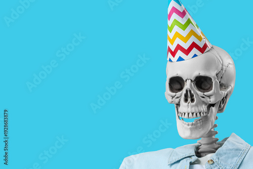 Human skeleton in party hat...
