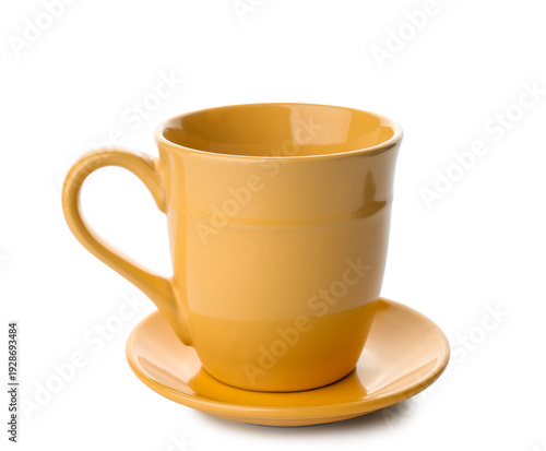 Yellow empty ceramic mug wi...