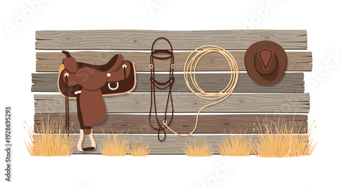 A brown leather saddle and a coiled rope hang alongside a bridle and a cowboy hat on a weathered wooden fence above patches of dry grass.