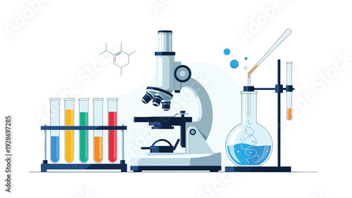 Laboratory workspace equipped with a white microscope, test tubes with colored liquids, and round bottom flasks for scientific research.