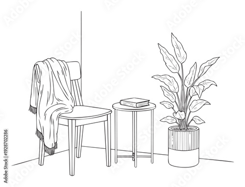 A cozy indoor corner featuring a wooden chair draped with a blanket, a small round side table holding a book, and a decorative potted houseplant, perfect for home comfort and reading nook