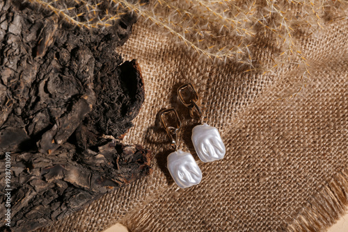 Beautiful earrings on sack ...