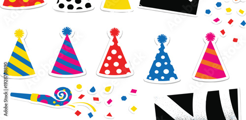 Colorful party hats and confetti scattered around a festive celebration scene viewed from directly above