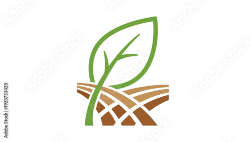 Green leaf sprouting from fertile farm land.