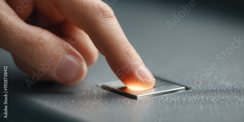 Fingerprint scanner finger press close up with warm glow and textured surface, security access control, biometric