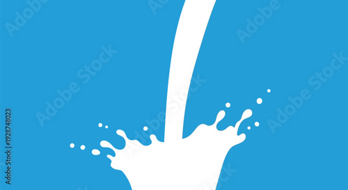 Fresh milk pouring into clear glass