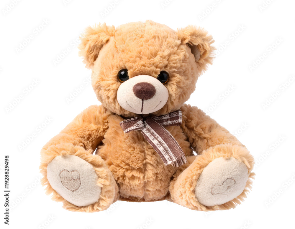 Fototapeta premium A plush tan teddy bear with a brown plaid bow