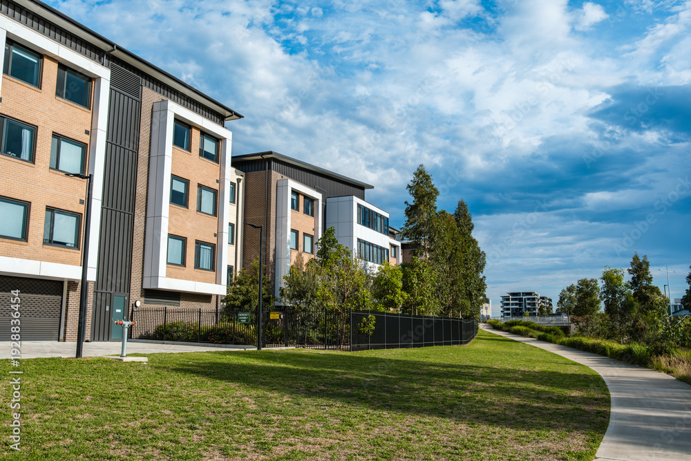 Obraz premium Residents and visitors experience suburban street life and community spaces in Oran Park Town, NSW, Australia, February 5, 2026
