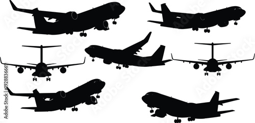 Black silhouettes of various airplanes on white background aircraft