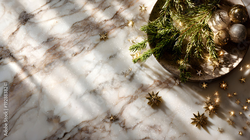 Marble table with festive pine greenery and gold star decorations gold stars