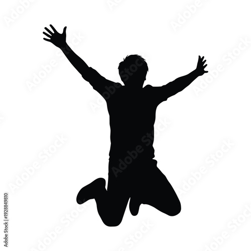 Silhouette of joyful man jumping with arms outstretched in air