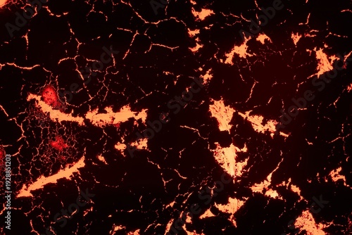 Vászonkép Texture of molten lava on black rock