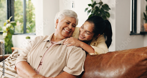 Tableau sur toile Hug, smile and woman with senior parent on sofa in home together for bonding, love or visit