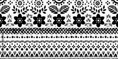 Black and white floral and geometric pattern with repeating motifs