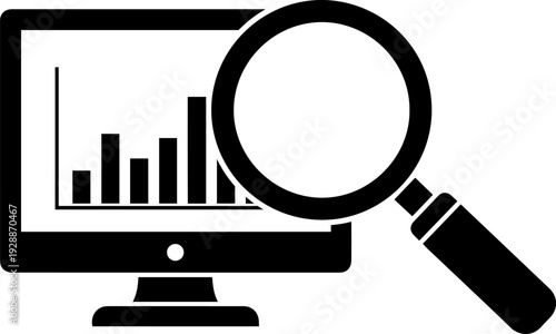 Magnifying glass analyzing data on computer screen for insights