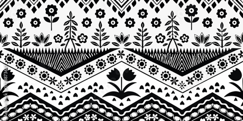 Black and white folk art pattern with stylized flowers and geometric shapes