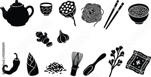 Asian food ingredients and utensils like teapot noodles chili bamboo and chopsticks