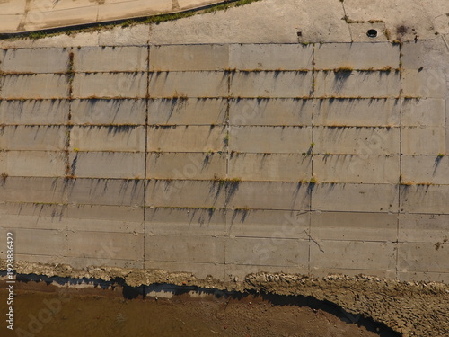 Wallpaper Mural Concrete wall with water stains and mold growth by waterline outdoors Torontodigital.ca