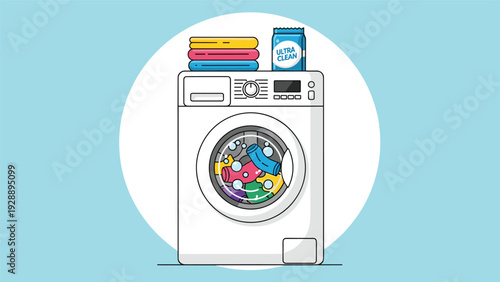 Modern white washing machine filled with laundry and topped with folded towels and a box of detergent for cleaning.