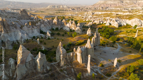 Wallpaper Mural Goreme, Nevsehir, Turkey. Intimate low flight over Love Valley trails with close view of unique rock formations during golden hour.. Aerial View Torontodigital.ca