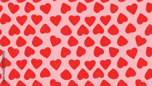 Pattern of red hearts scattered on a light pink background, creating a playful and romantic design. The hearts vary slightly in size and position.