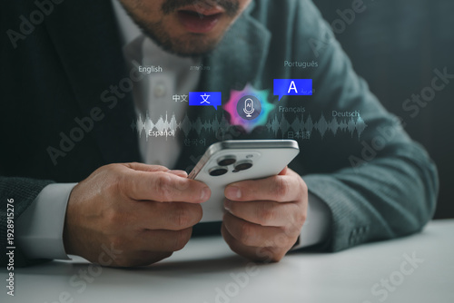 Photography Businessman using smartphone for AI voice translation app with multilingual icons, speech recognition and sound wave for international communication, global business and language learning