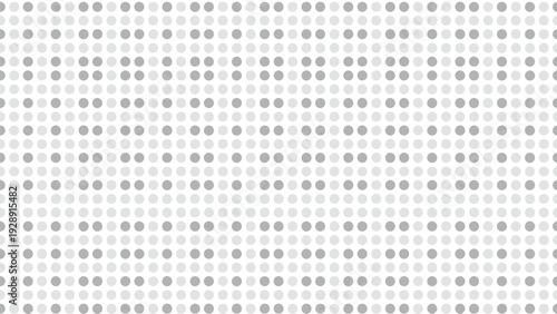 Pattern of evenly spaced small gray dots on a white background, creating a minimalist and orderly design. The tone is simple and uniform.