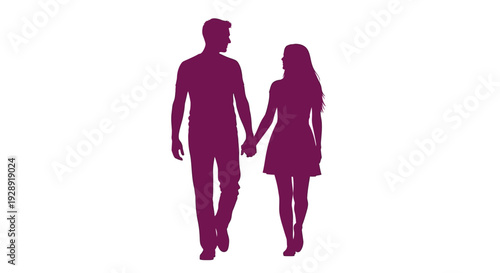 Couple walking hand in hand on city streets at night