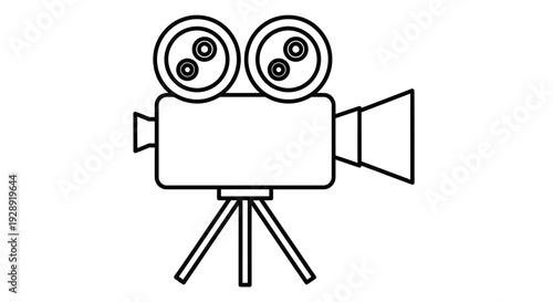 A film camera sits on a tripod in a studio setting for recording.