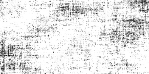 Abstract Texture: A detailed close-up reveals a rough, textured surface, showcasing a pattern of subtle imperfections and a visual interplay of light and shadow. 