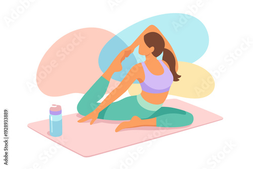 Woman practicing yoga in a studio performing a complex pose.