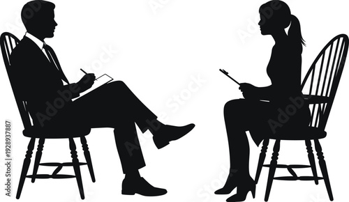 Silhouettes of a man and woman in chairs, engaged in a conversation or interview, setting
