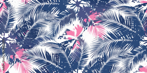 Colorful tropical palm leaves create a vibrant and repeating pattern