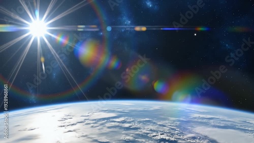 Sunrise over Earth from space with lens flare and stars