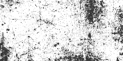 Abstract grunge background with black ink splashes and dirty paint stains creates an old textured wall pattern for artistic wallpaper design